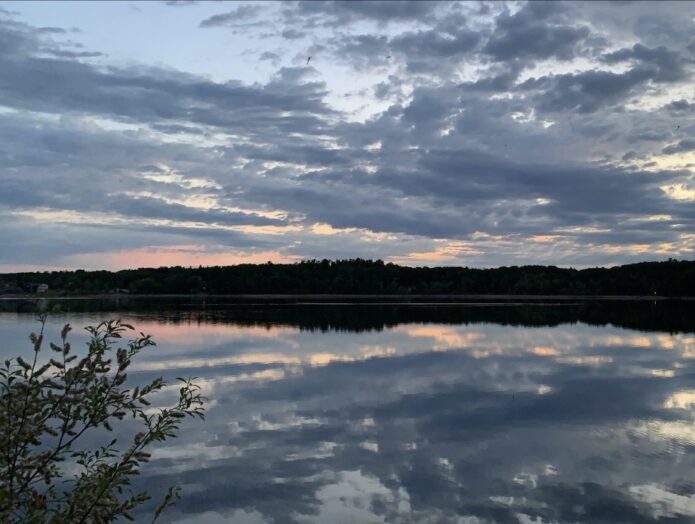 Clouds, trees and water